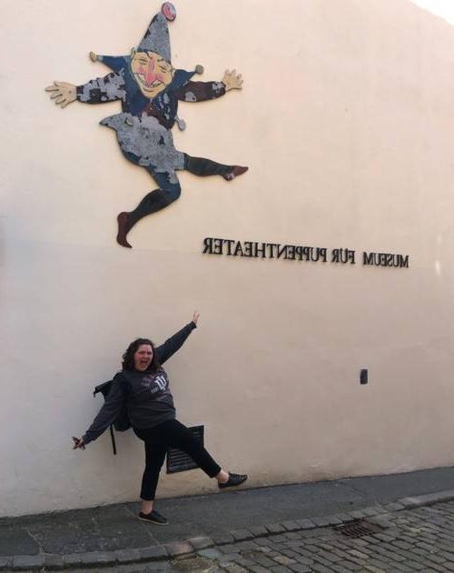 Stephanie Tanis in front of a theater